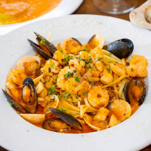 Volare Restaurant's seafood linguine with mussels, shrimp, and clams in a rich red sauce.